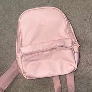 Pink Reebok mini backpack